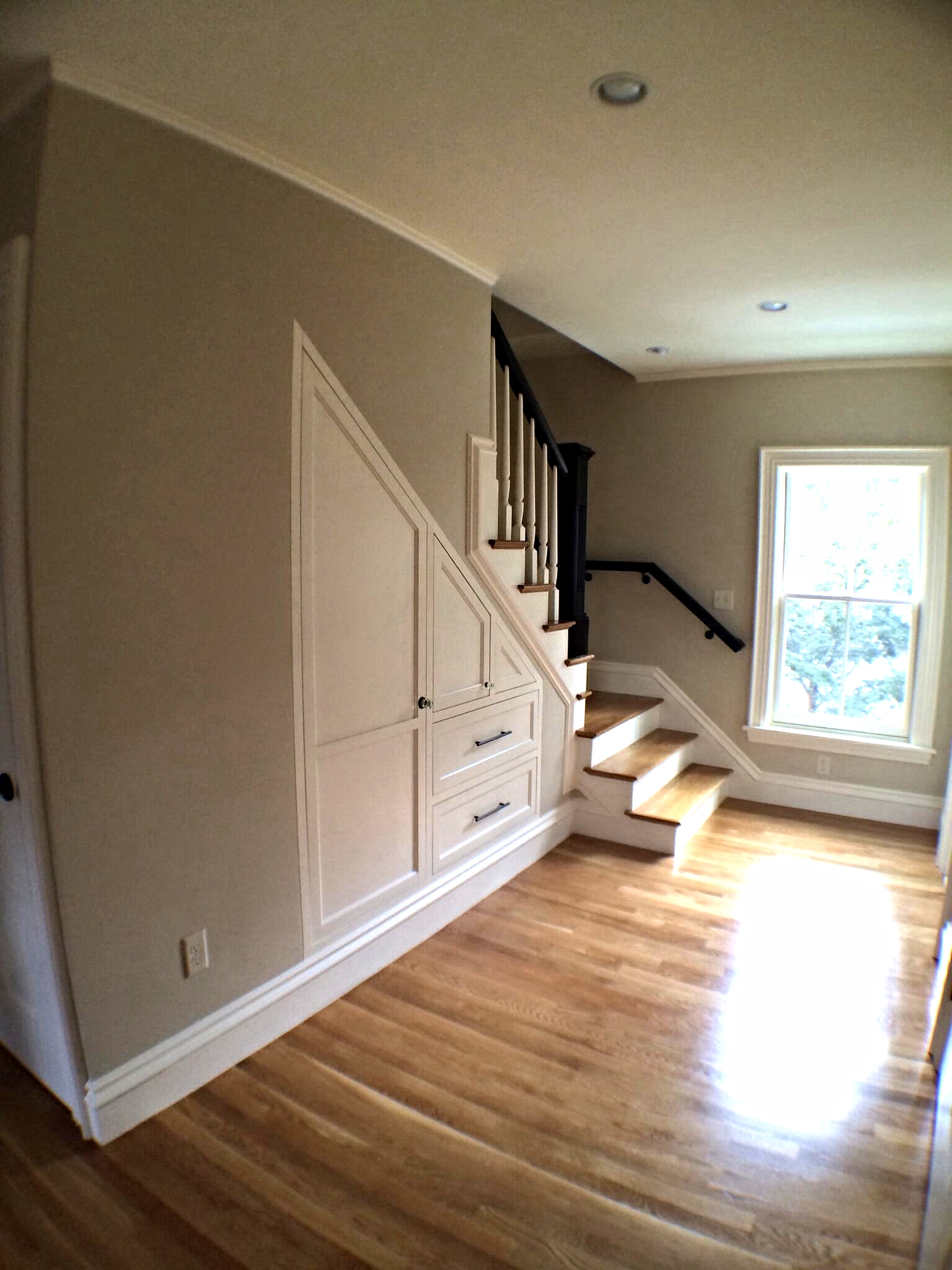 New stairs to 3rd floor with built-ins