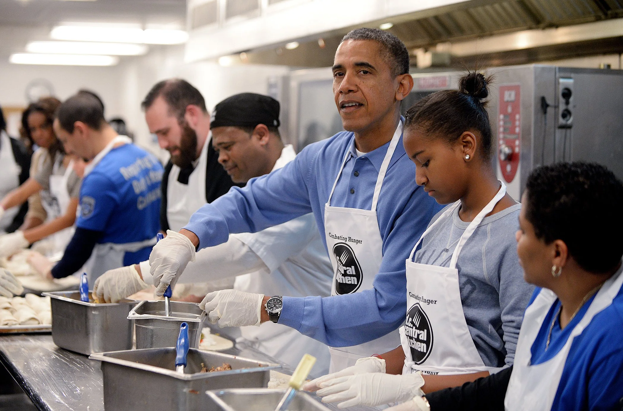 The Obama family volunteered at a food kitchen in 2014.