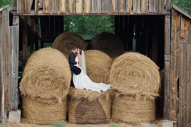 I just love having my couples jump up on hay bales.