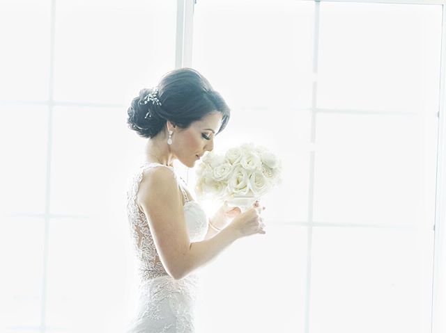 Sometimes the bride just needs a moment with her beautiful bouquet.  @butterflyfloral