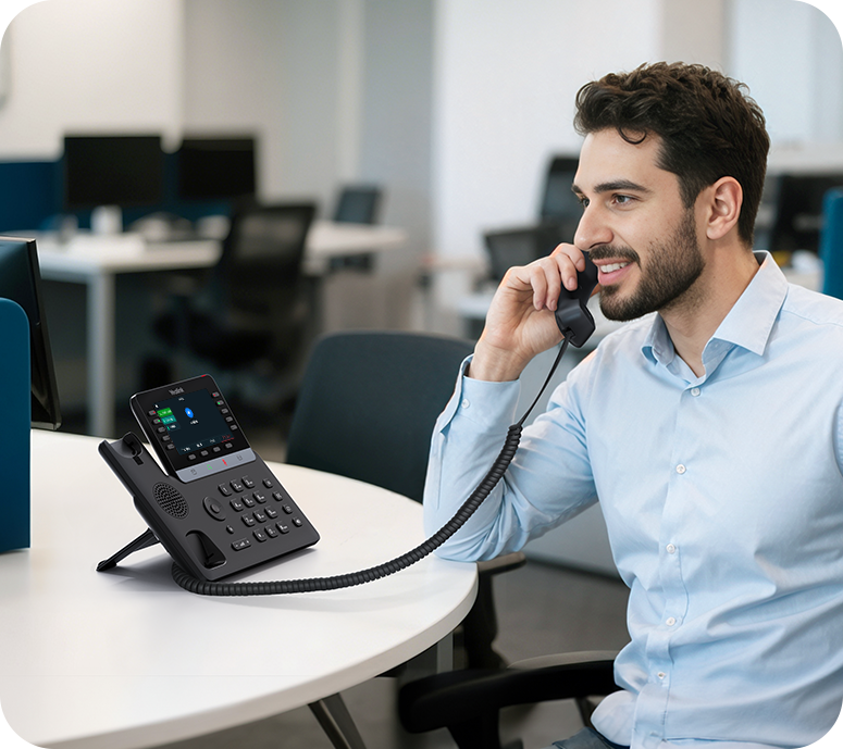Yealink T74W IP desk phone on an office desk