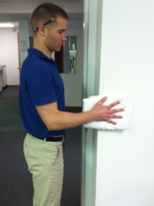 Hand or wrist pushes into wall 5-10 seconds from the shoulder. 