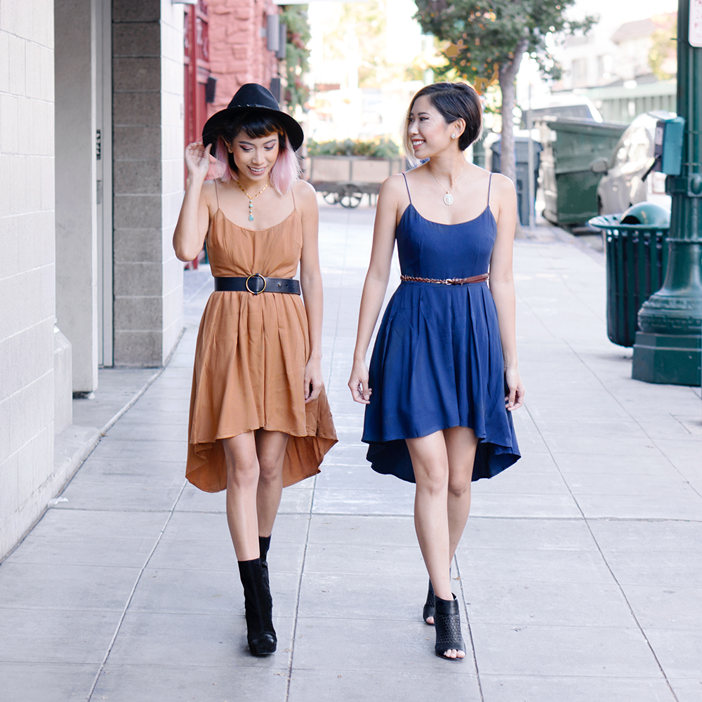   Meghan  Dress:   Perfect Pleats Hi-Lo dress in Camel   Shoes:  Free People  Necklace:   Teardrop Lariat Necklace   &nbsp;  Melanie  Dress:   Perfect Pleats Hi-Lo dress in Navy   Shoes:  Target  Necklace:  Faux Opal Necklace  &nbsp; We simply can't 