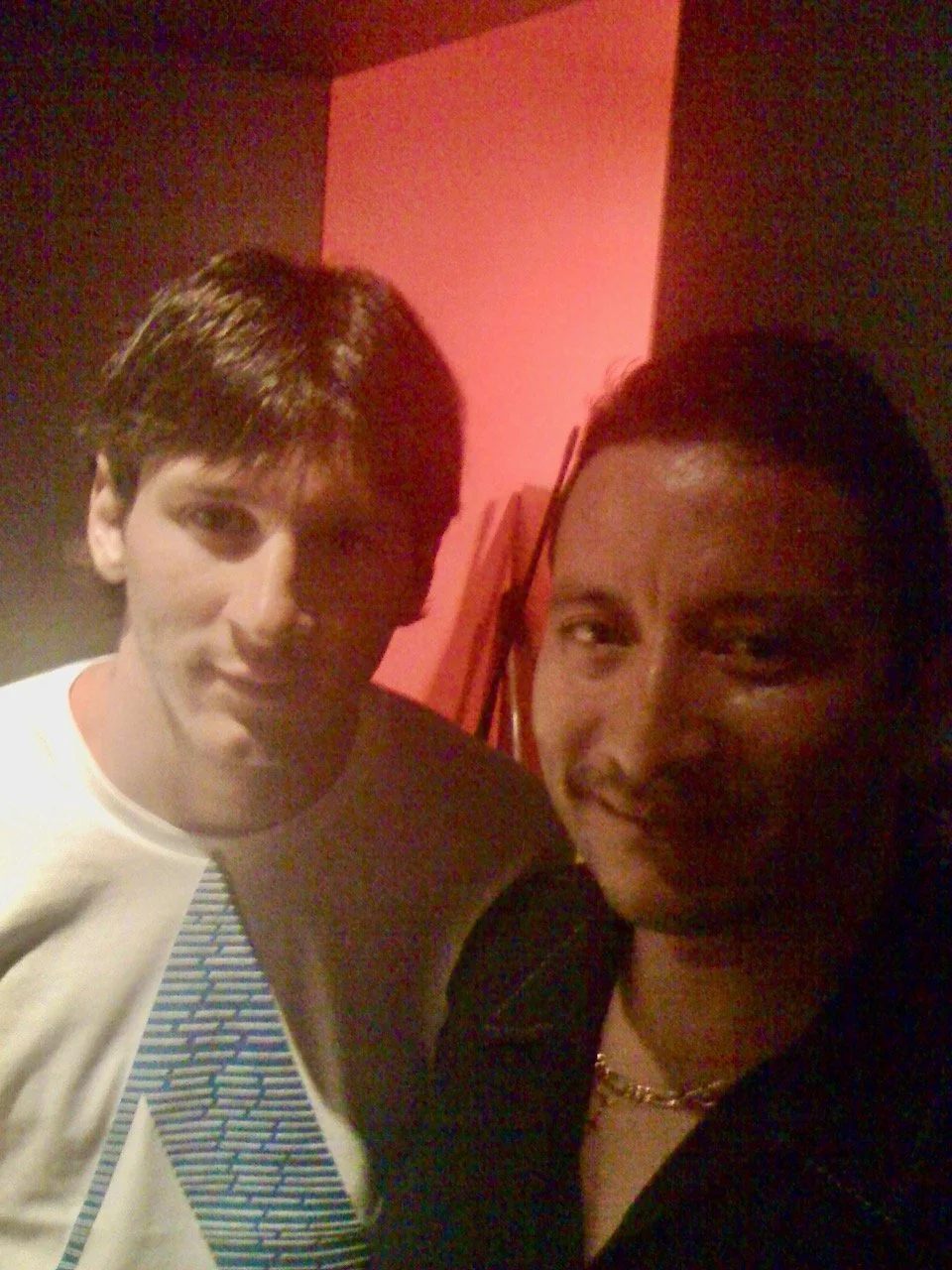 Lionel Messi with Lemy Argueta in Los Angeles on July 14, 2009