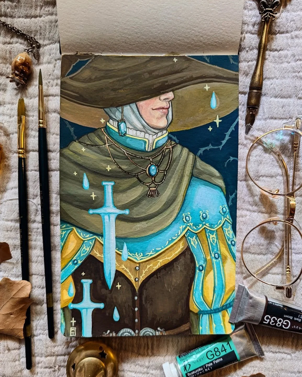 Another small painting in the sketchbook 🖌️ featuring everyone's favorite unlucky sorcerer from Elden Ring, Rogier. 
.
.
.
.
#eldenring #sketchbookpages #holbein #gouacheillustrations #sorcererrogier #rogier #tarnished #eldenringfanart #fromsoftware
