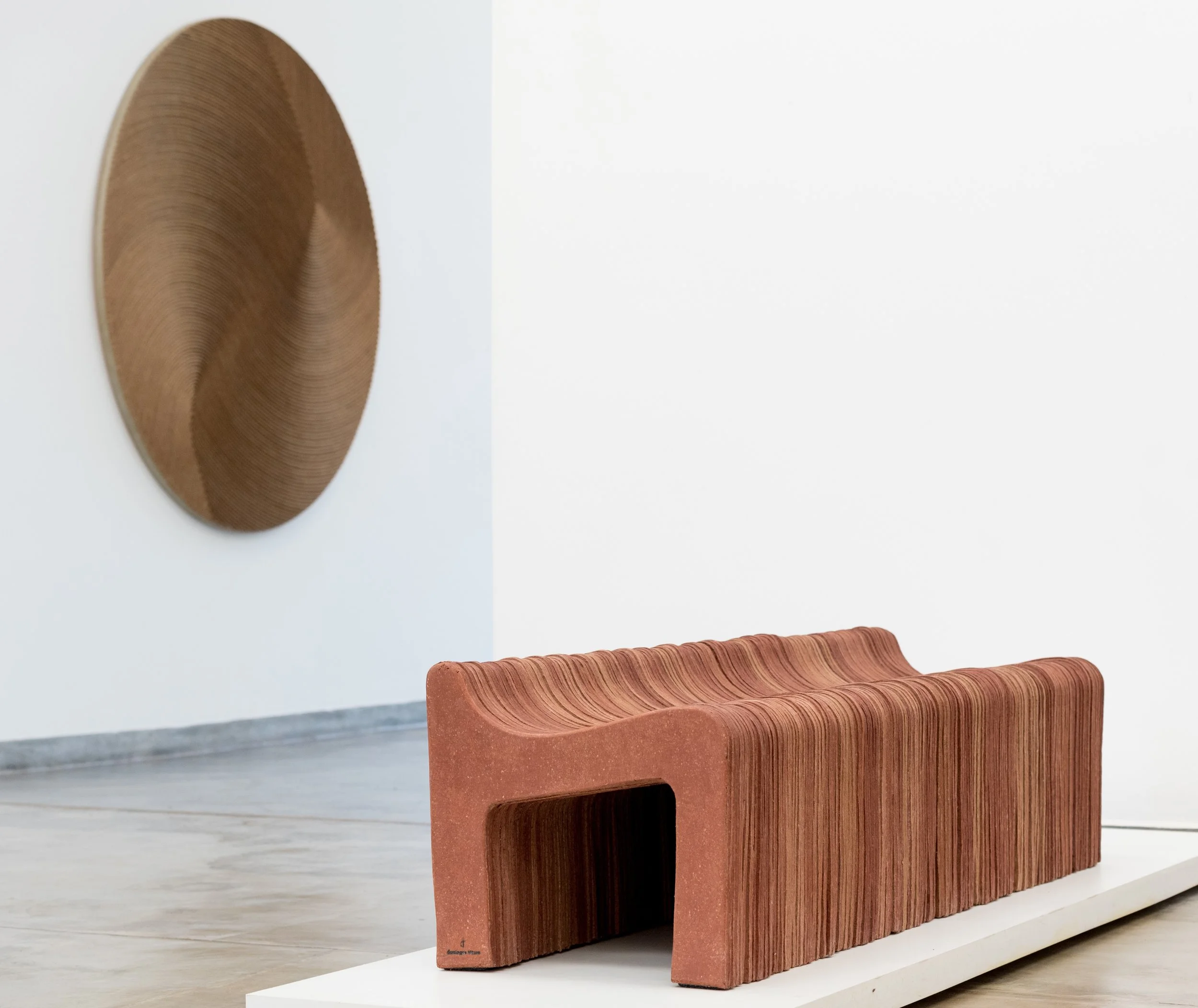 Kraft bench and frisos disk by Domingos Tótora