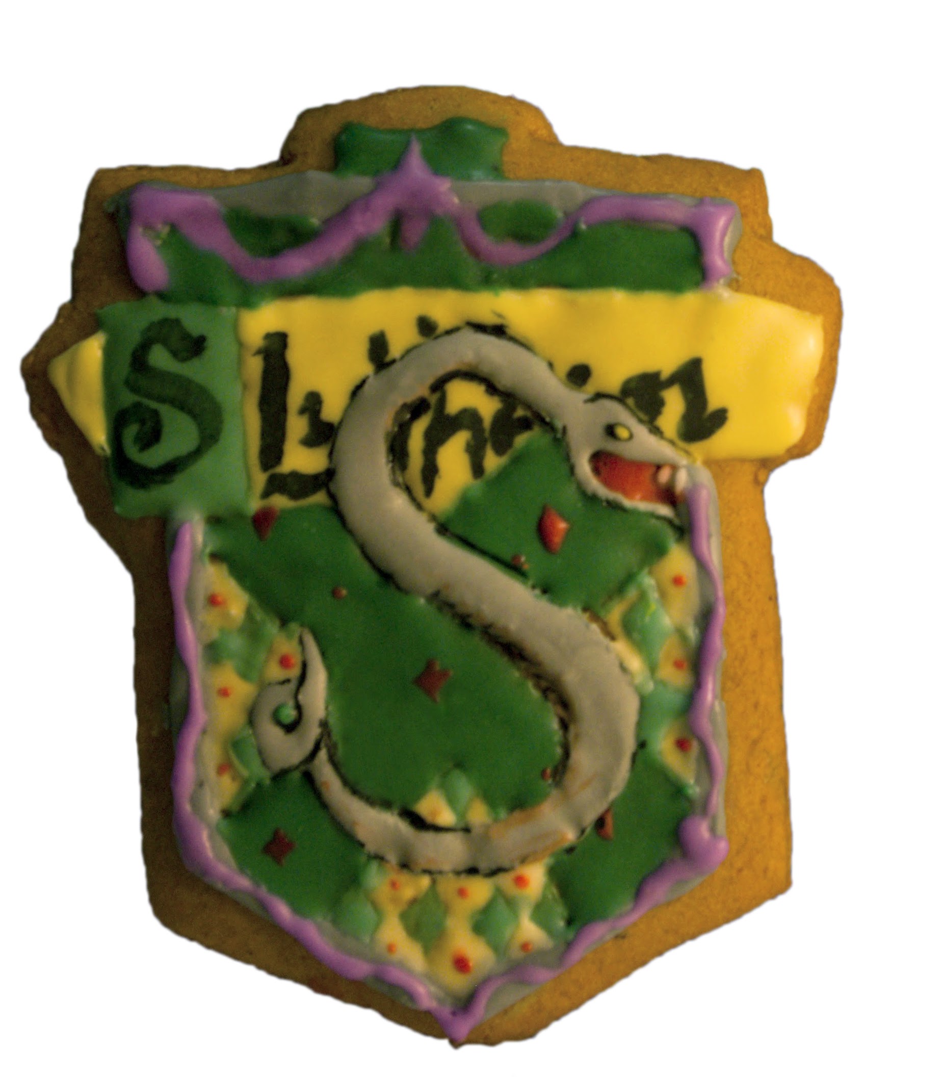 Slytherin house gingerbread cookie with hand-painted royal icing