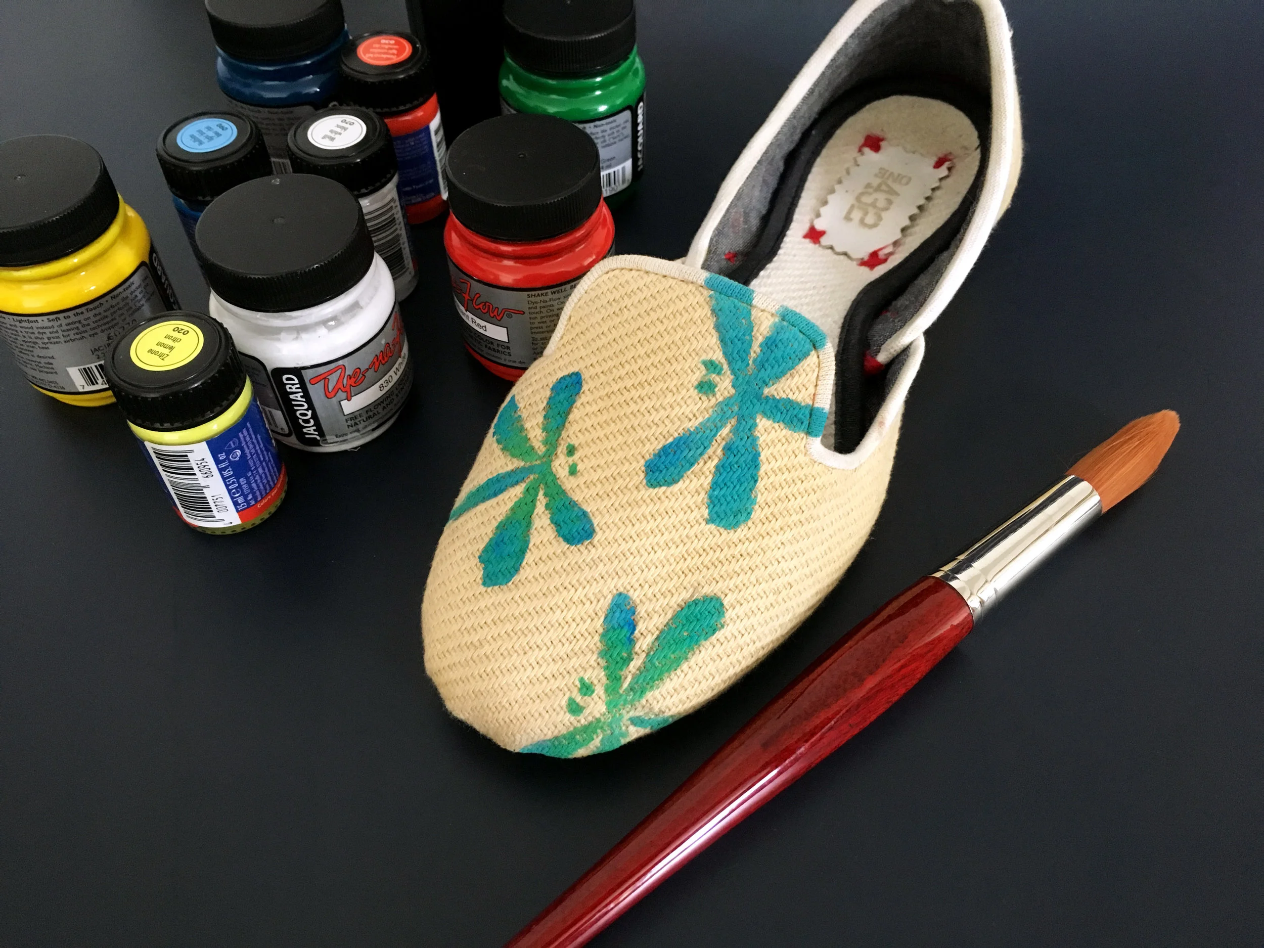 Live shoe painting at Jussara Lee