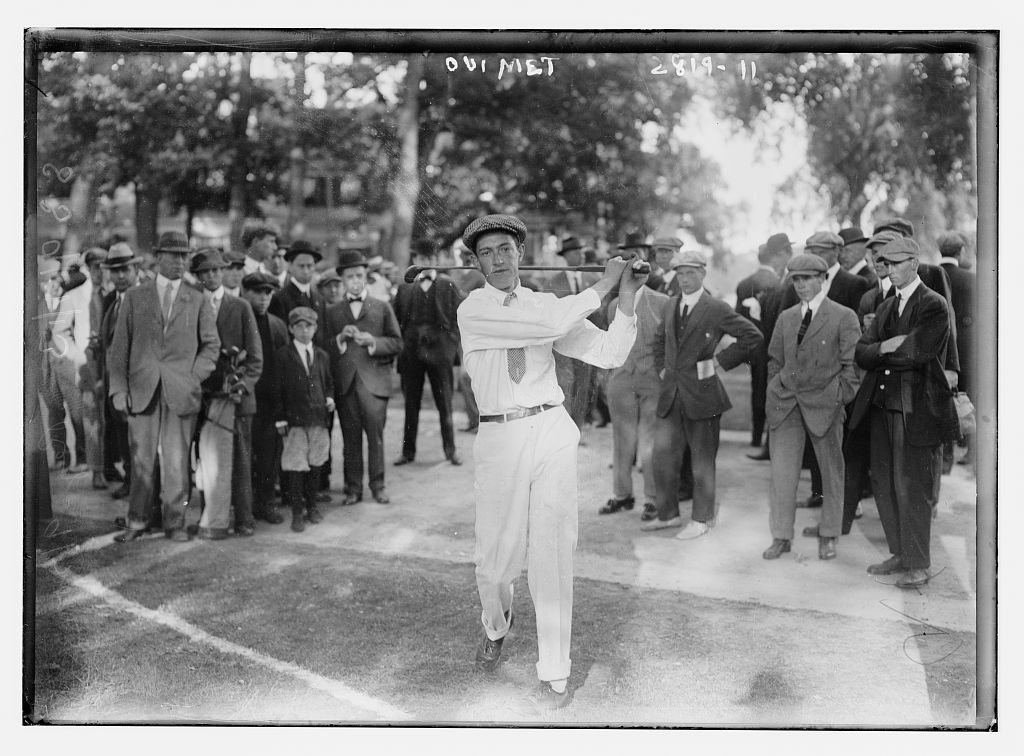 Brookline hero Francis Ouimet hits away in front of the local gallery.