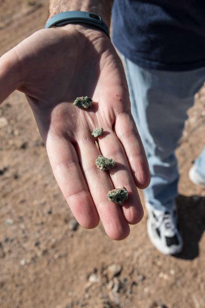  A visitor holds Trinitite fragments, WSMR, New Mexico. 