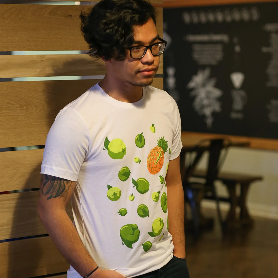 Be The Pineapple Tee - Apples are safe, common, and ordinary. But the pineapple is anything but. In a world full of apples, be the pineapple. Rom. 12:2