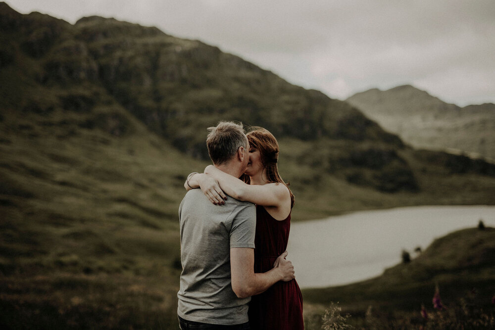  bride and groom elopement in scottish higlands loch in the back 