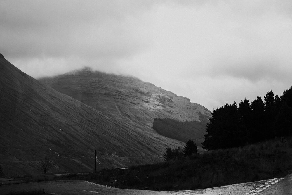  Engagement session couple in Scottish mountains rain and wind 