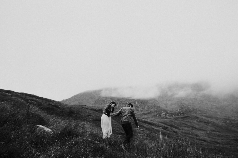  Engagement session couple in Scottish mountains rain and wind 