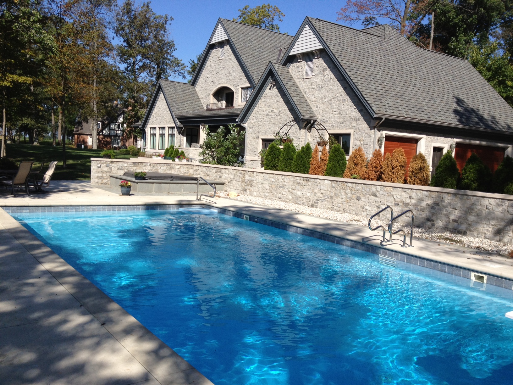 Swimcraft Pool w automatic cover and recessed ladder and corner step.jpeg
