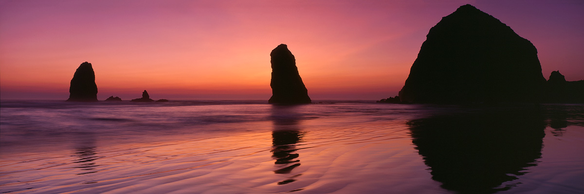 "Cannon Beach Sunset" Fuji Provia 100f 6x17, 105mm lens. 4 seconds at f22, 2 stop soft GND filter.