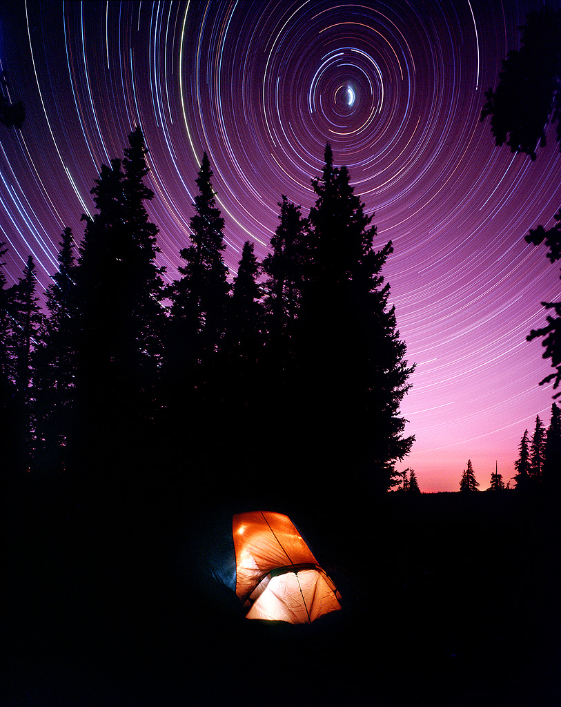 "Snowy Range Camping" - Provia 100f 4x5, 75mm lens. 7 hours at f8, no filters. Tent was lit up from the inside with my flashlight for about 3 minutes.