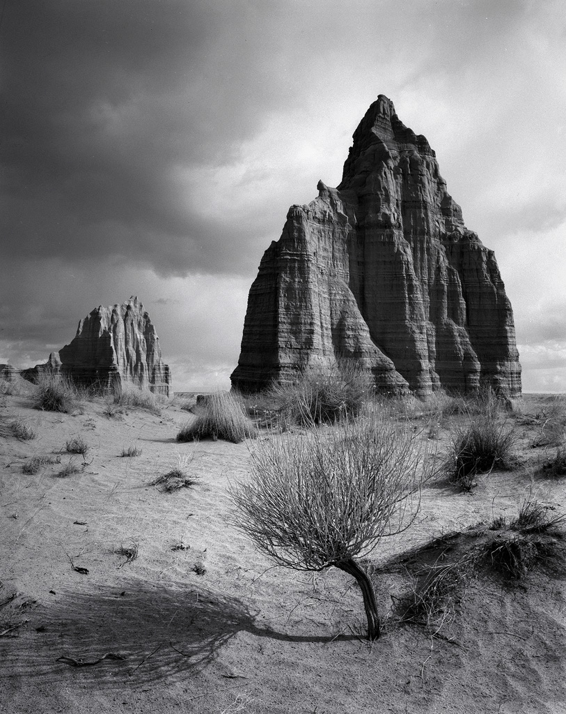 "Enchanted Temples" - Storms over the Temples of the Sun and Moon create a moody black and white scene in Utah's Capitol Reef National Park. Handmade black and white prints available.