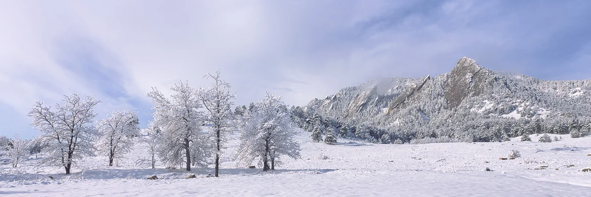 “Flatiron Snow” - A spring snowstorm covers the Boulder flatirons and the surrounding forest in crisp white powder. Prints Available.