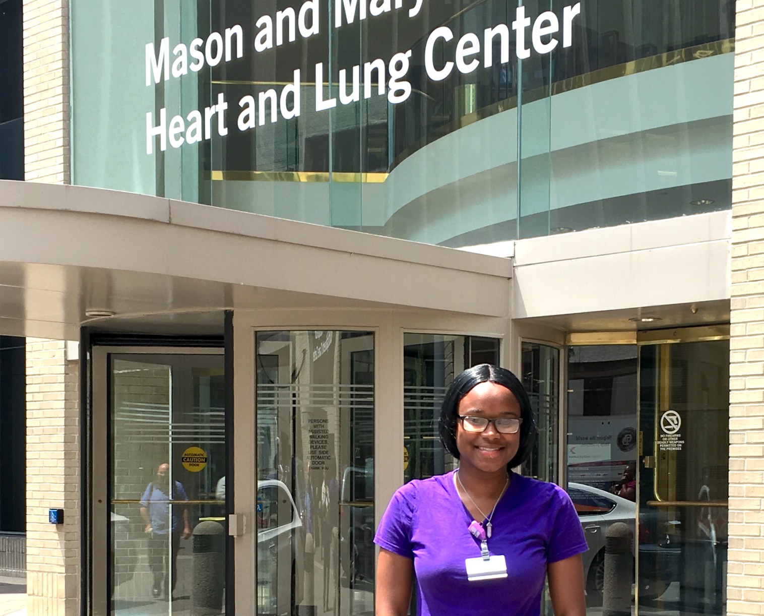 Ayona West poses in front of the heart and lung center at Jewish Hospital. | Photo by Boris Ladwig