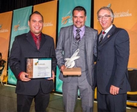 Nelson Derickson (left) and Mic Werstuik (middle) accepting the award.
