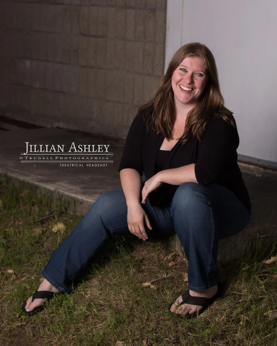 Natural smile from comedian Jillian Ashley Bruyere.  Is it possible the photographer was funny? Or perhaps Light Man Dave? Maybe Detail Girl Rosie?  We may never know.  It's likely that she was coming up with some new material for her…