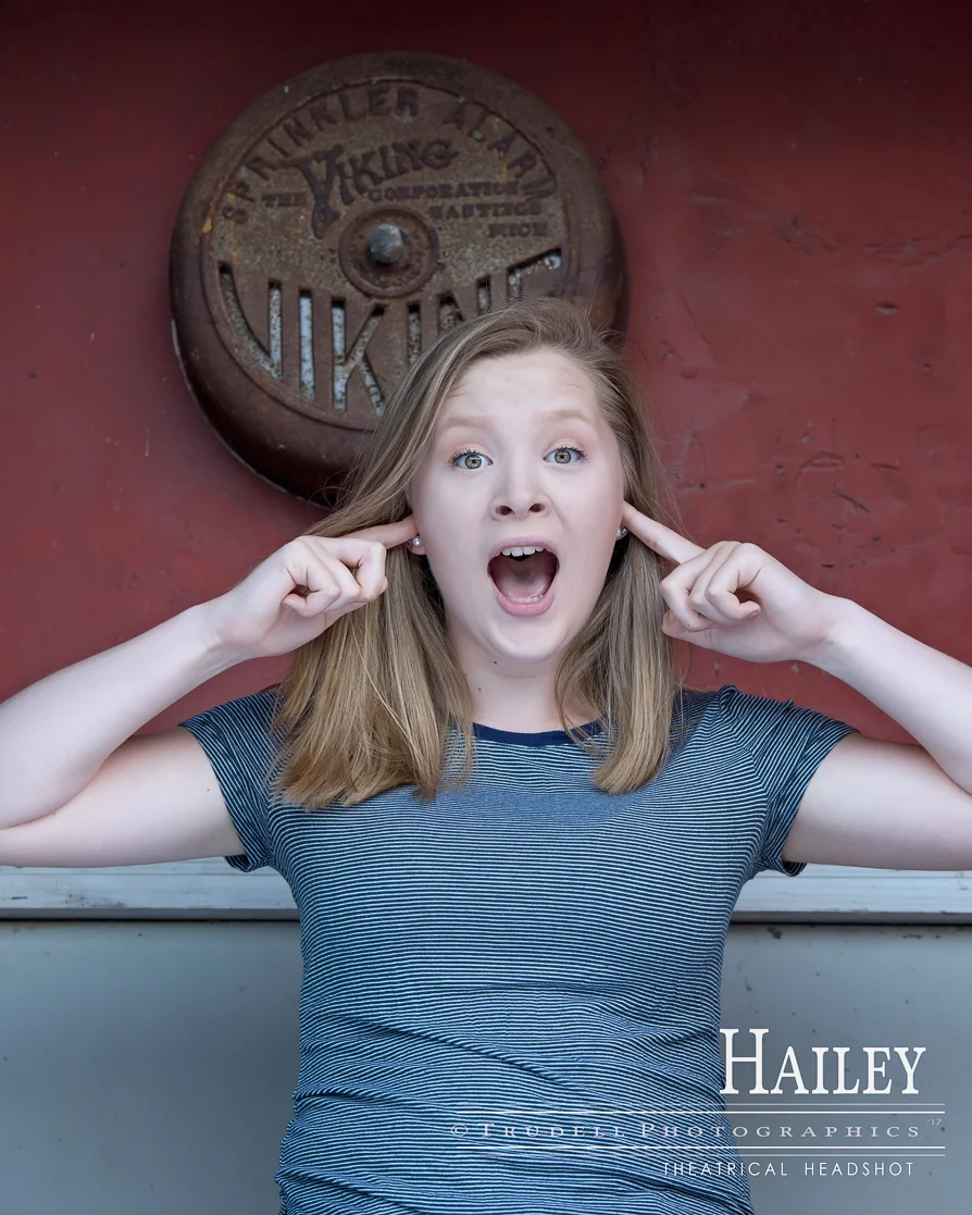 This shot of Hailey happened just as she was about to step down. Her mom asked if we could incorporate the alarm into the shot and give the impression that it's sounding. I love it when parents have great ideas that turn into great images!