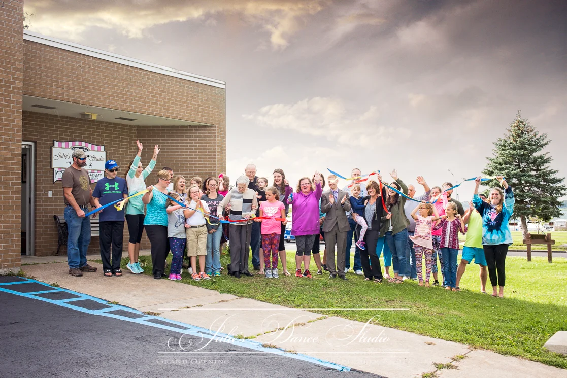 Rain rain went away but not before photobombing us! Julie cuts the ribbon amidst rain drops. Some of her nearest and dearest express their joy (little Hopi is hiding in there somewhere). To be here among these people is a great honor!