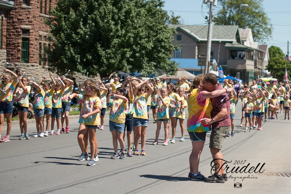 The number of twirlers is mind boggling! This amazing woman can do it all.