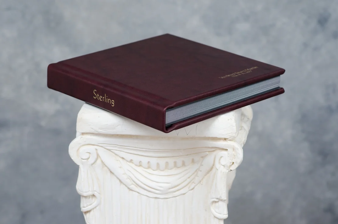 Leather-Bound signature album with embossing.