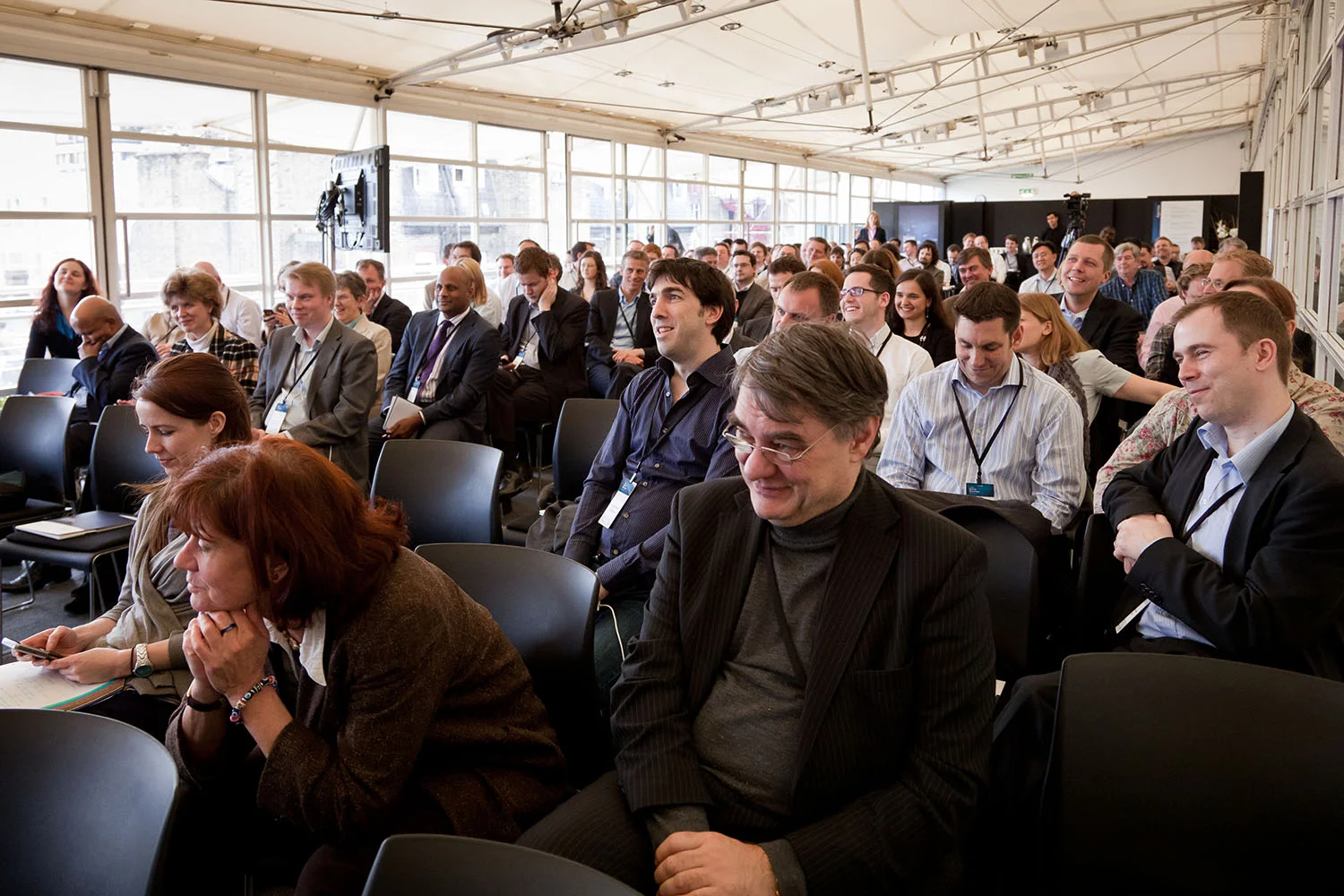 classroom shot of smiling attendees.jpg