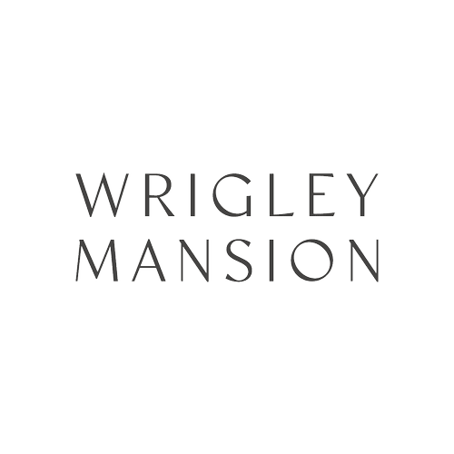 Text reading 'WRIGLEY MANSION' with a transparent background.
