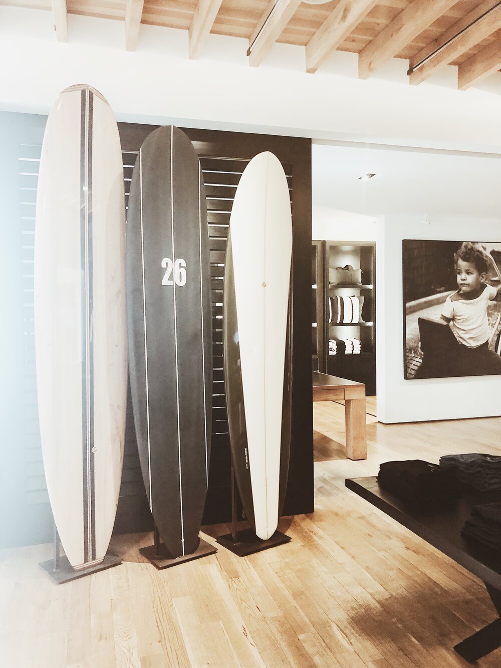 surfboards inside James Perse store