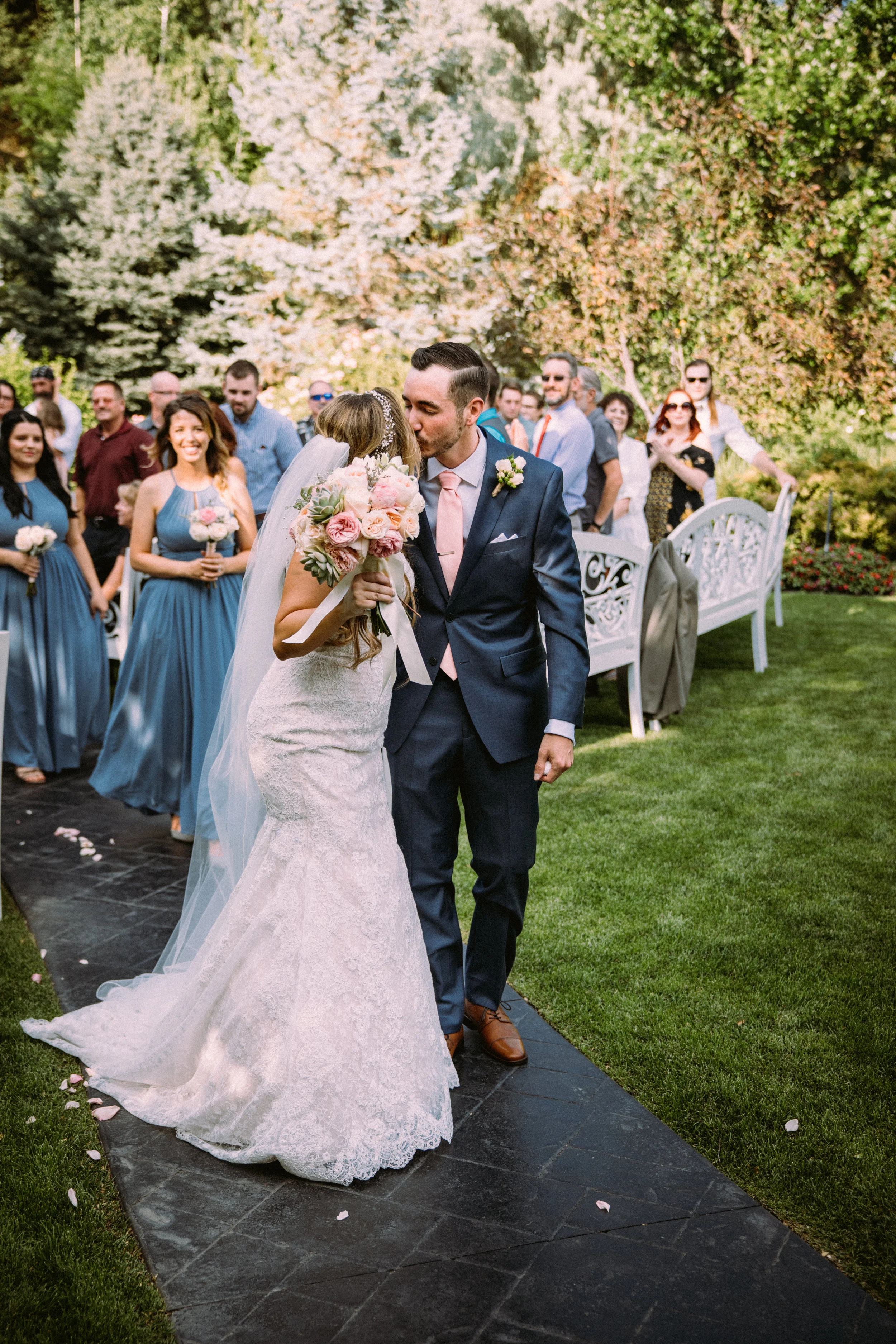  Bride and Groom celebrate after wedding. Drapter Utah.  