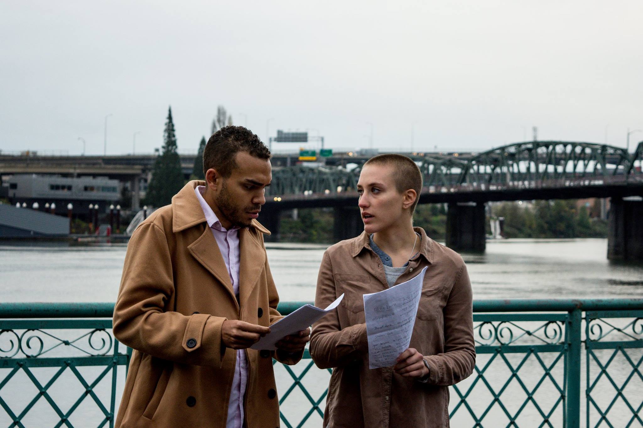 Photo of McKelvey and Stevens sharing notes and speaking at a protest in Portland, Oregon courtesy of Benjamin Kerensa. 