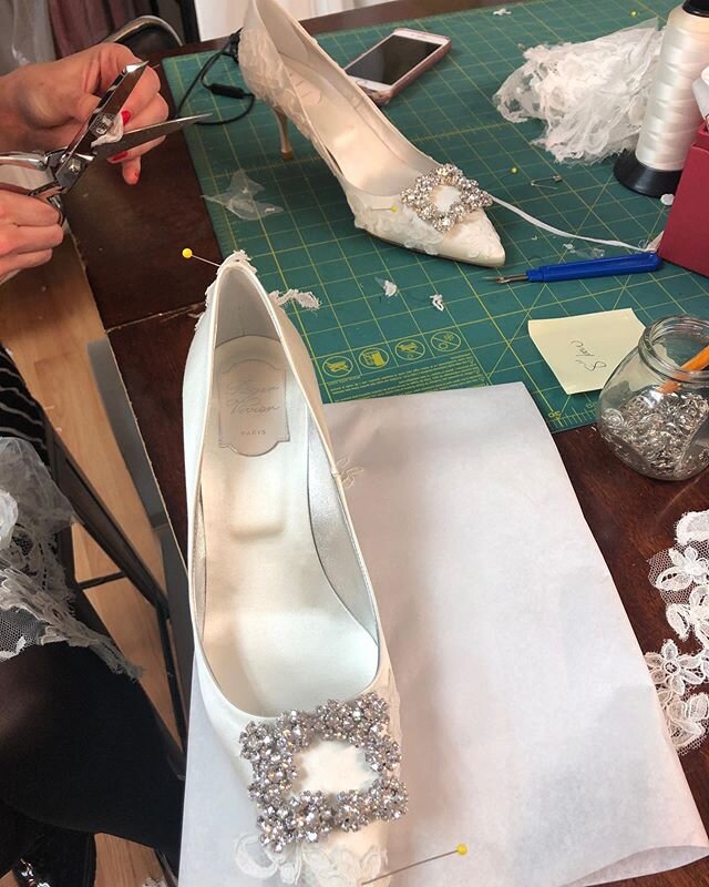 Adding French lace to our brides @rogervivier satin shoes. It takes time to make something beautiful. DM or comment on your favorite artists pages to give them some love. That includes florists, photographers, cake designers, makeup &amp; hair artist