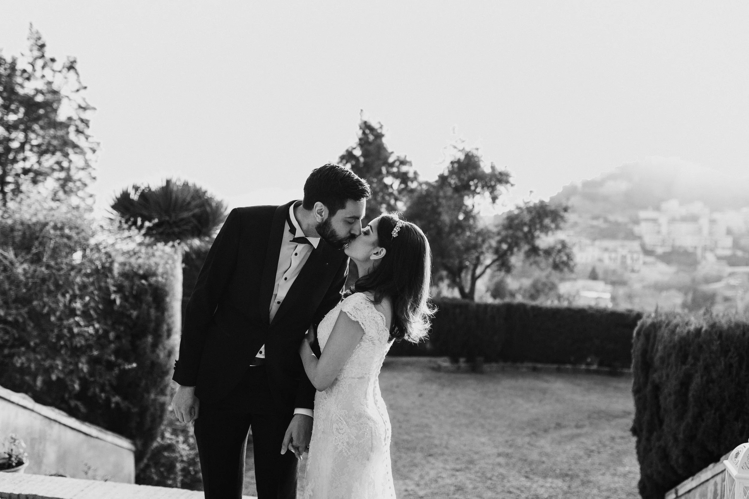 Bride and groom kissing in Malaga Spain wedding photographer