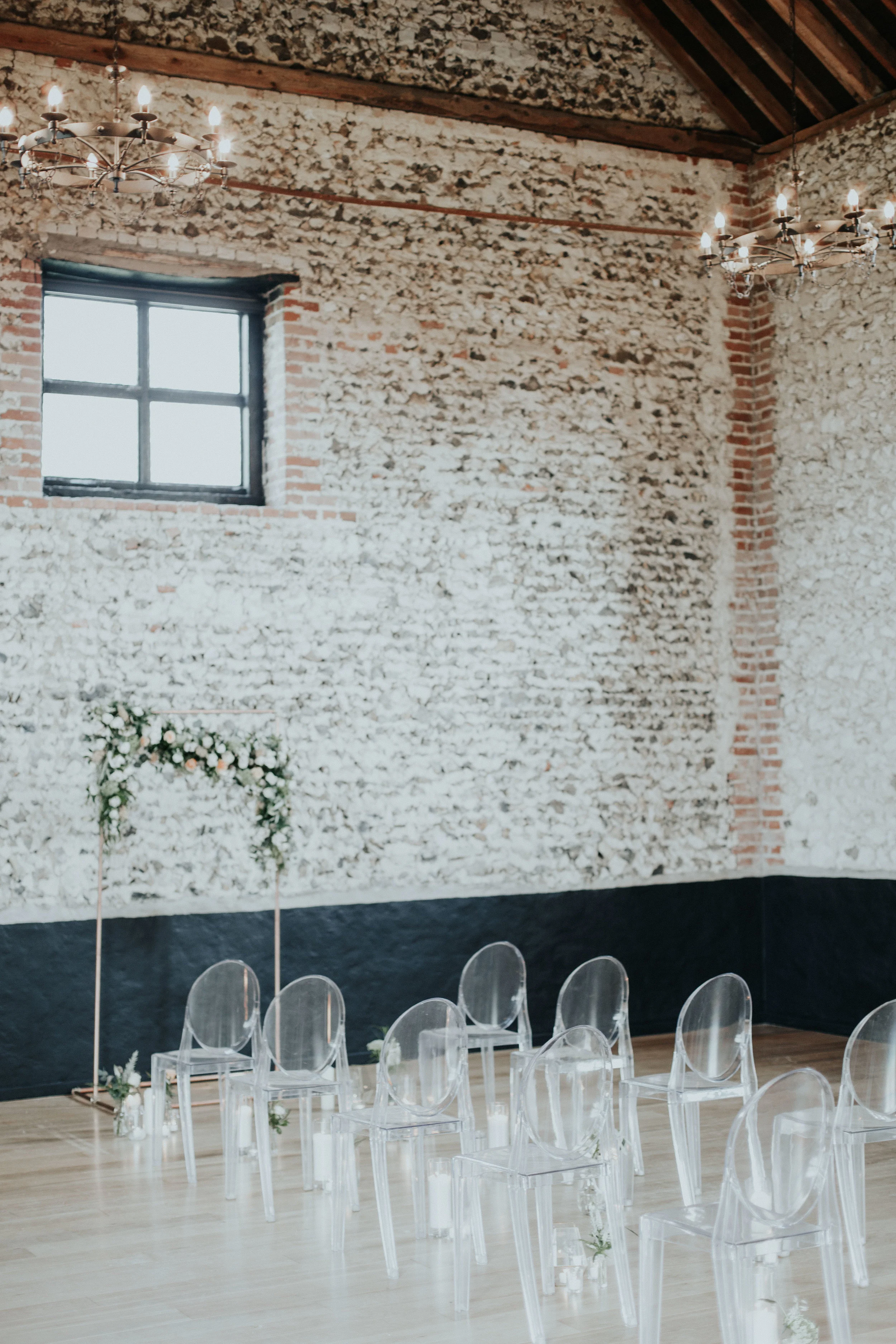 Clear chairs wedding set up