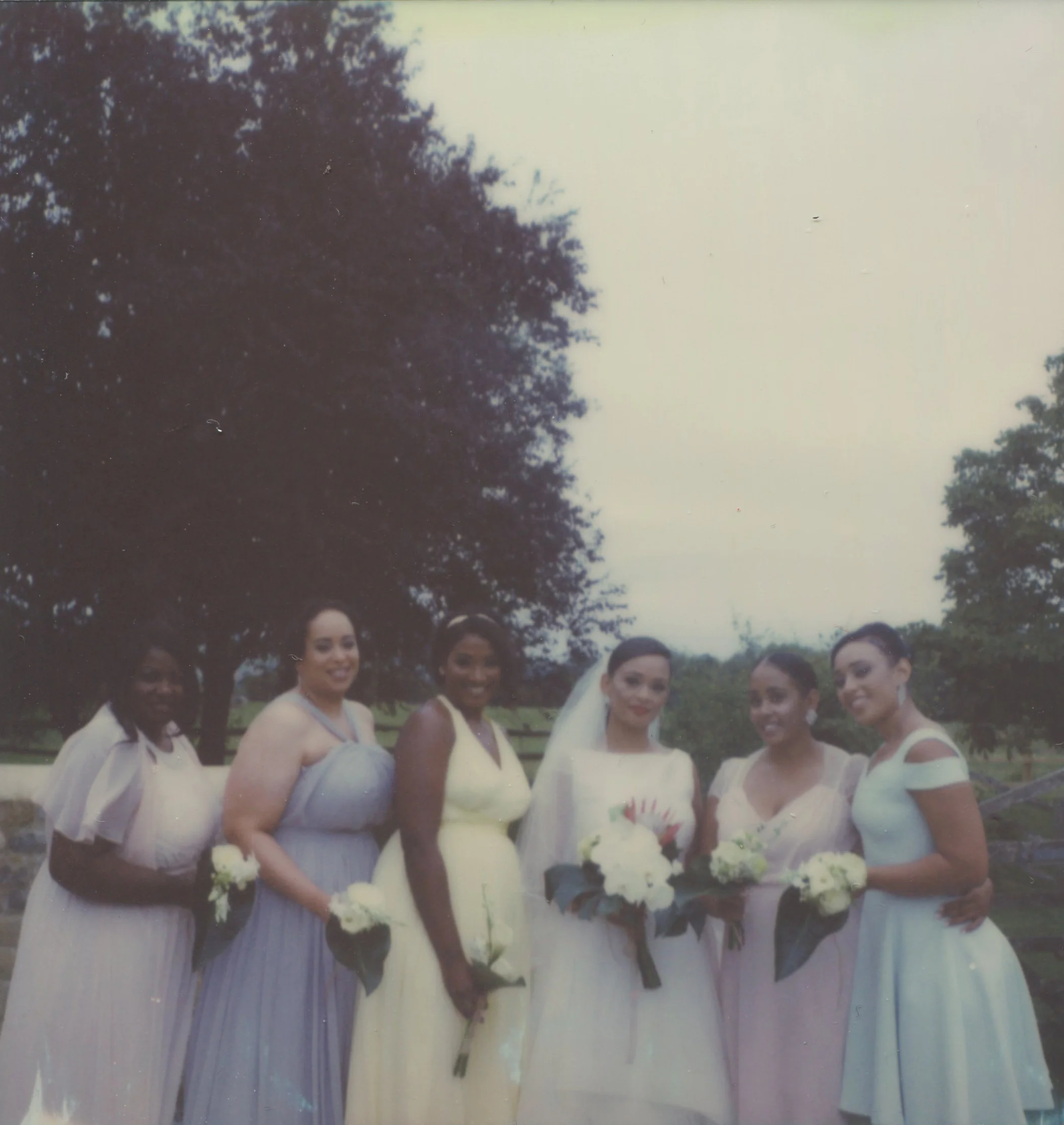 Bridesmaids Polaroid wedding photographer