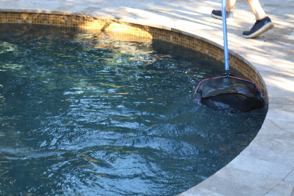 East Coast Pools Inc. Cleaning pool.webp
