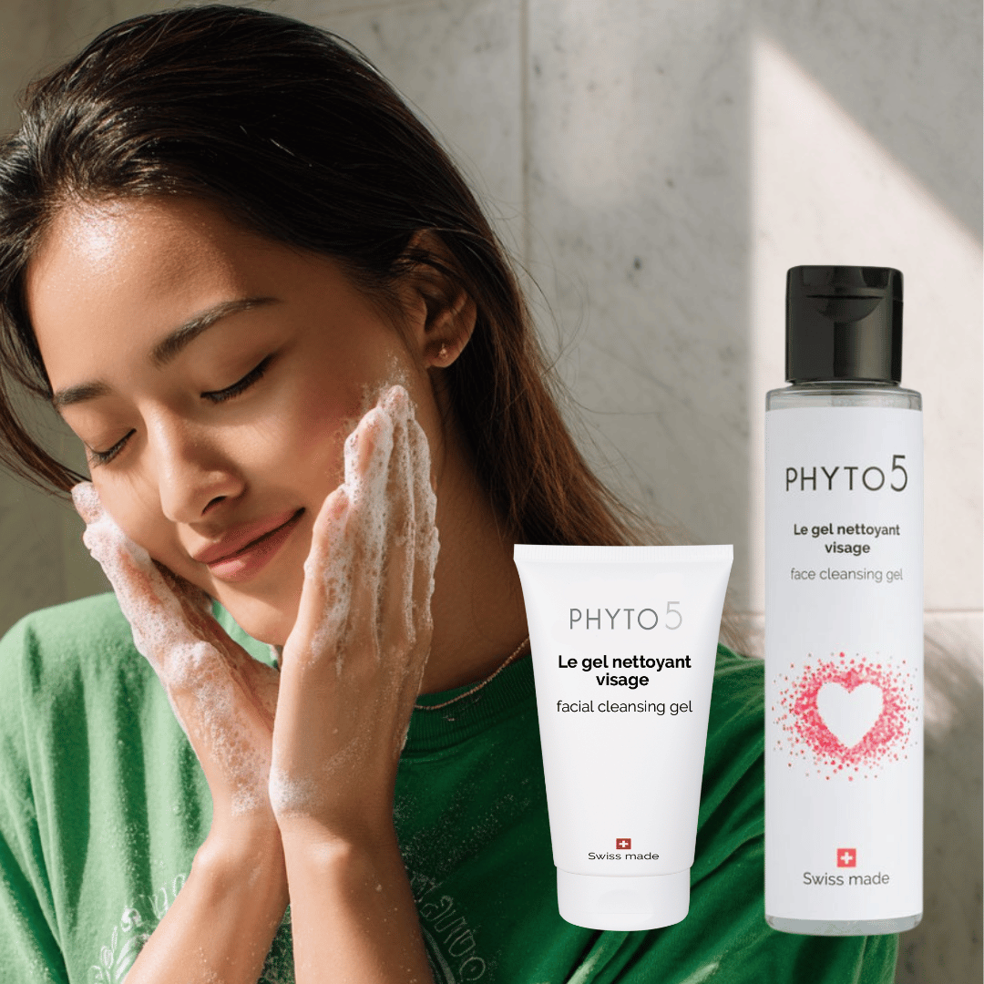 A young Asian woman washes her face with foaming Cleansing Gel