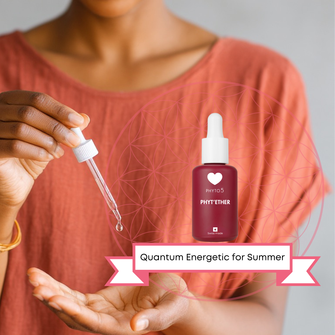 An African American woman drops one drop of Fire Phyt'Ether serum into the palm of her hand