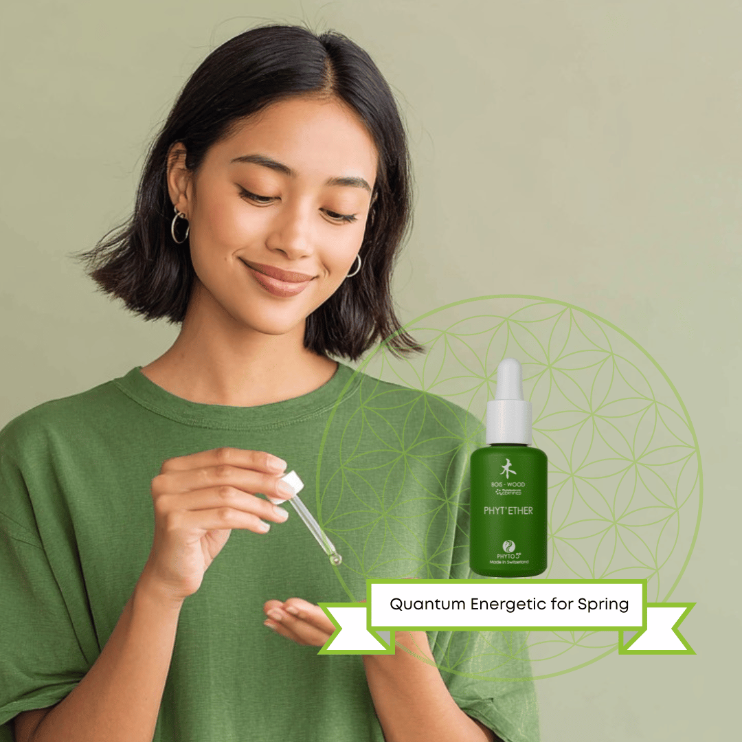 A young Asian woman dispensing a drop of Wood serum into her hand