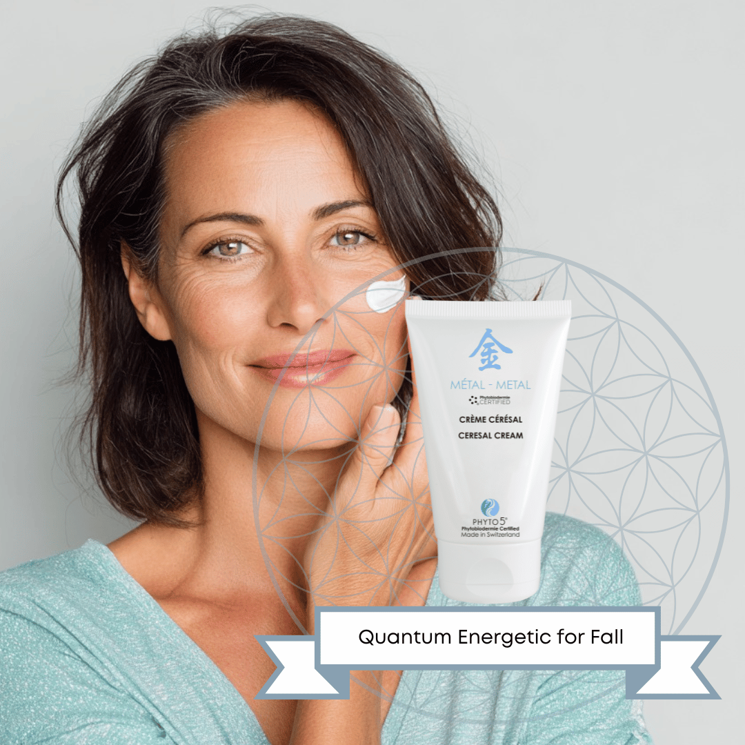 A middle-aged woman applies Metal element Day Cream to her face