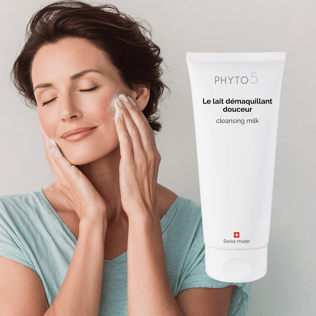 A middle-aged woman cleanses her face with mild Cleansing Milk