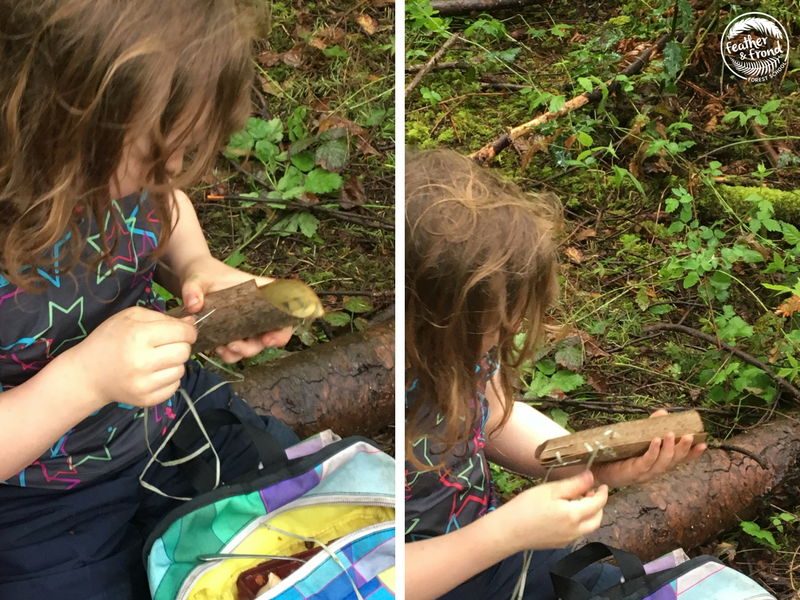 Sewing up the sides of the bent bark to make a basket!