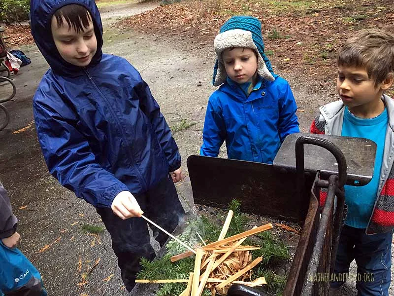 Practicing our fire making skills using very long matches