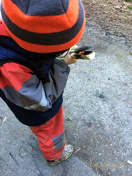 helping with coal-burned spoon-making