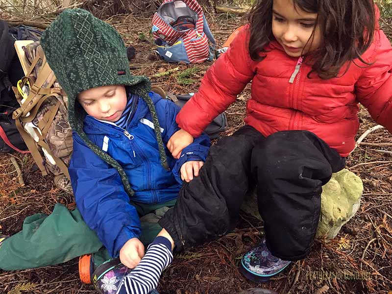 A hungry mud monster ate Apollonia's boot and she had to change her sock!