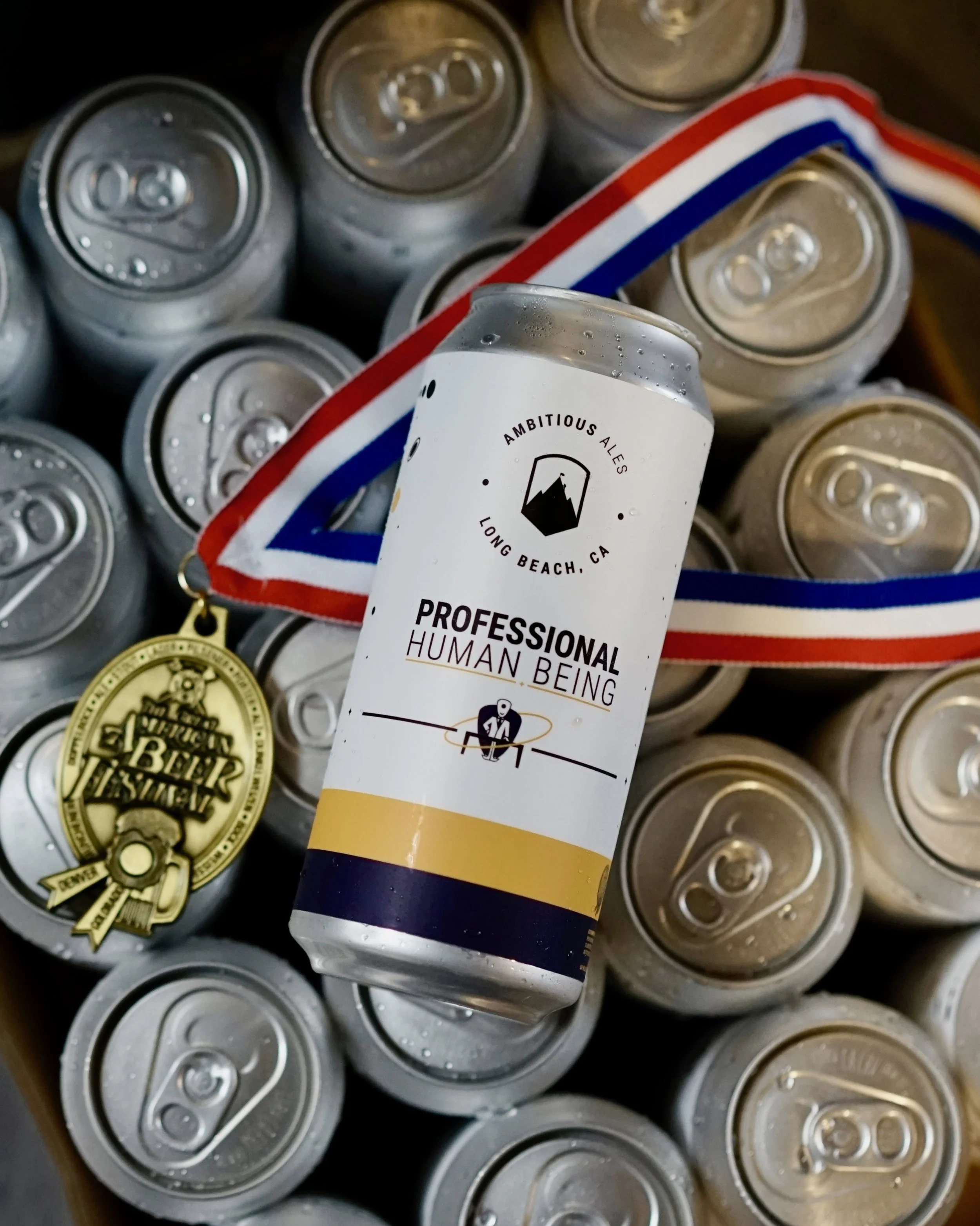 Ambitious Ales Professional Human Being GABF Gold medal winning Hazy IPA brewed in Long Beach CA